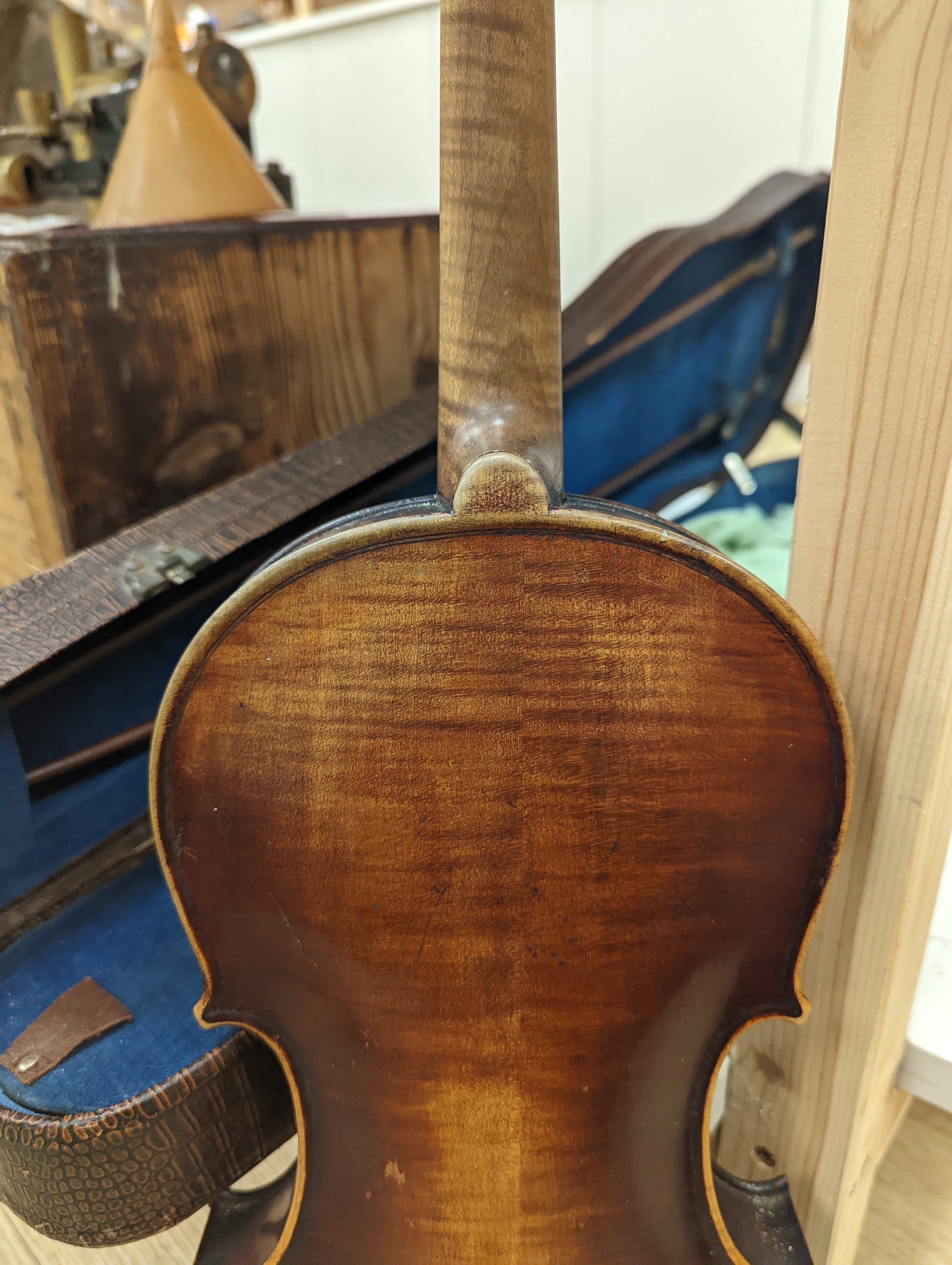 A late 19th century German violin and two bows, cased